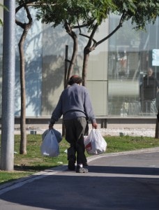 man carrying bags