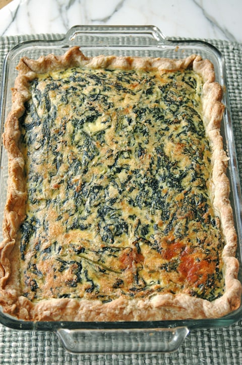 rectangular glass pan of savory pie