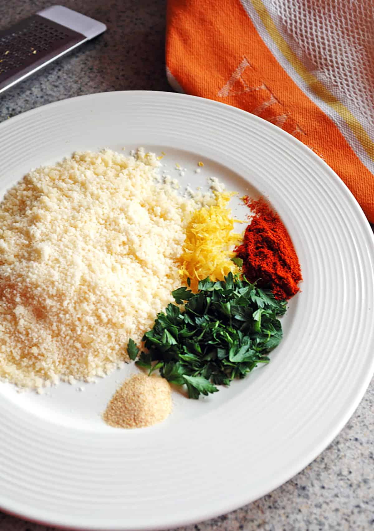plate with Parmesan, parsley, seasonings