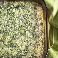 Photo of glass pan of Creamed Spinach Souffle with Artichokes