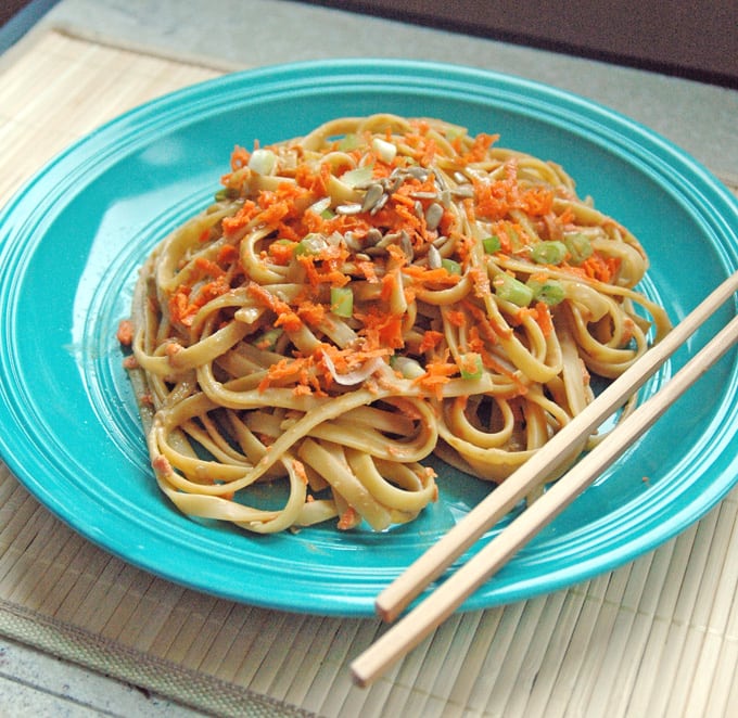 plate of Fettuccine with Peanut Sunflower Sauce on a plate with chop sticks