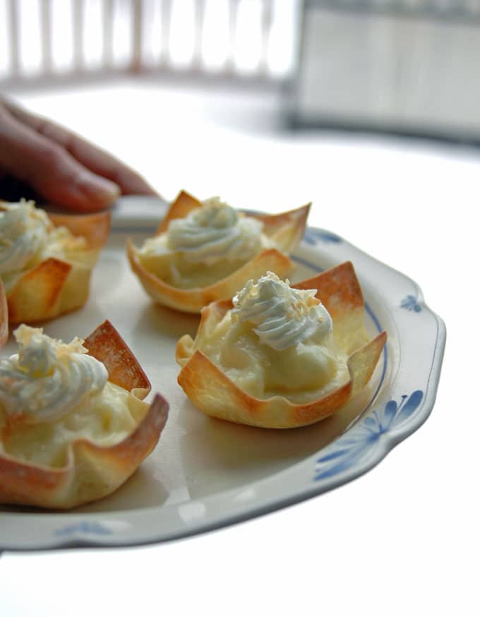 coconut cream pie cups on a plate
