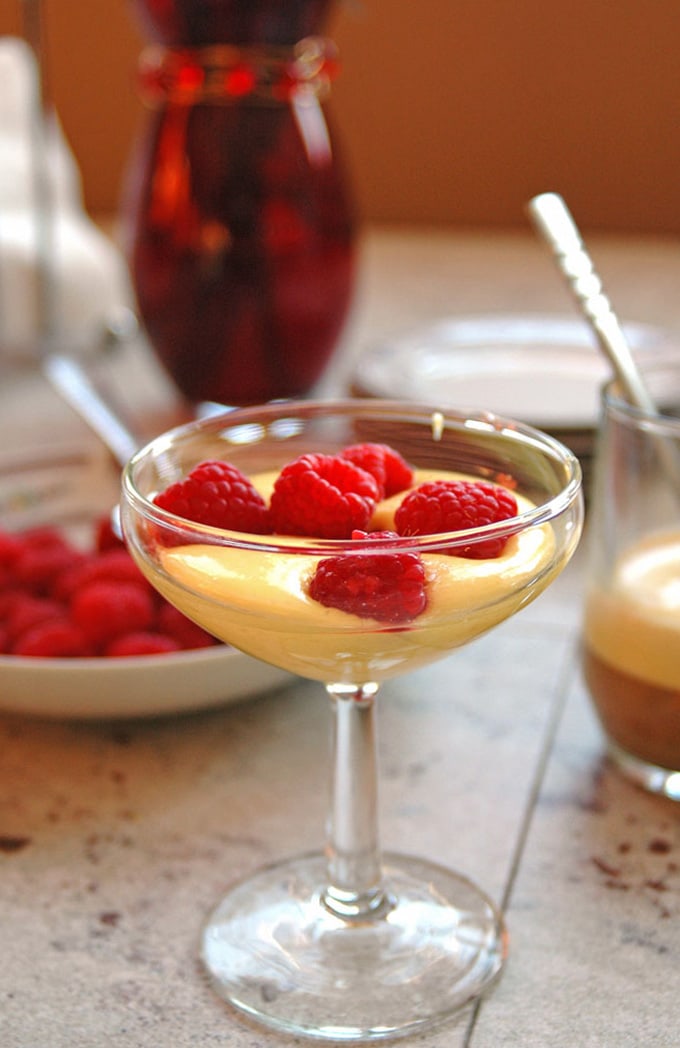 close-up of Breakfast Zabaglione with Berries and Espresso in a martini glass
