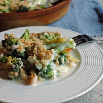 close-up photo of Broccoli and Fontina Gratin on a plate with fork