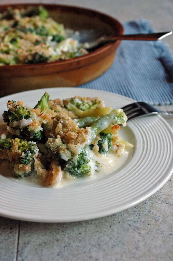 close-up photo of Broccoli and Fontina Gratin on a plate with fork