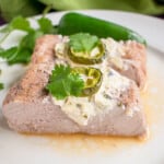 photo of sliced stuffed pork tenderloin with cream cheese and jalapenos