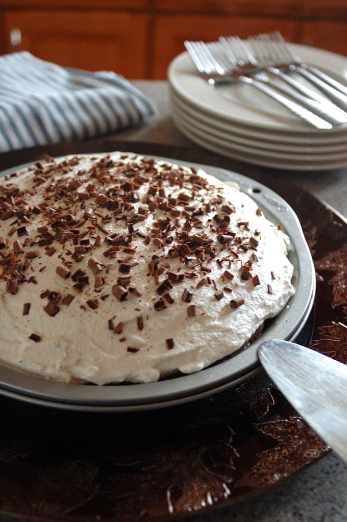 pie with whipped cream and chocolate curls