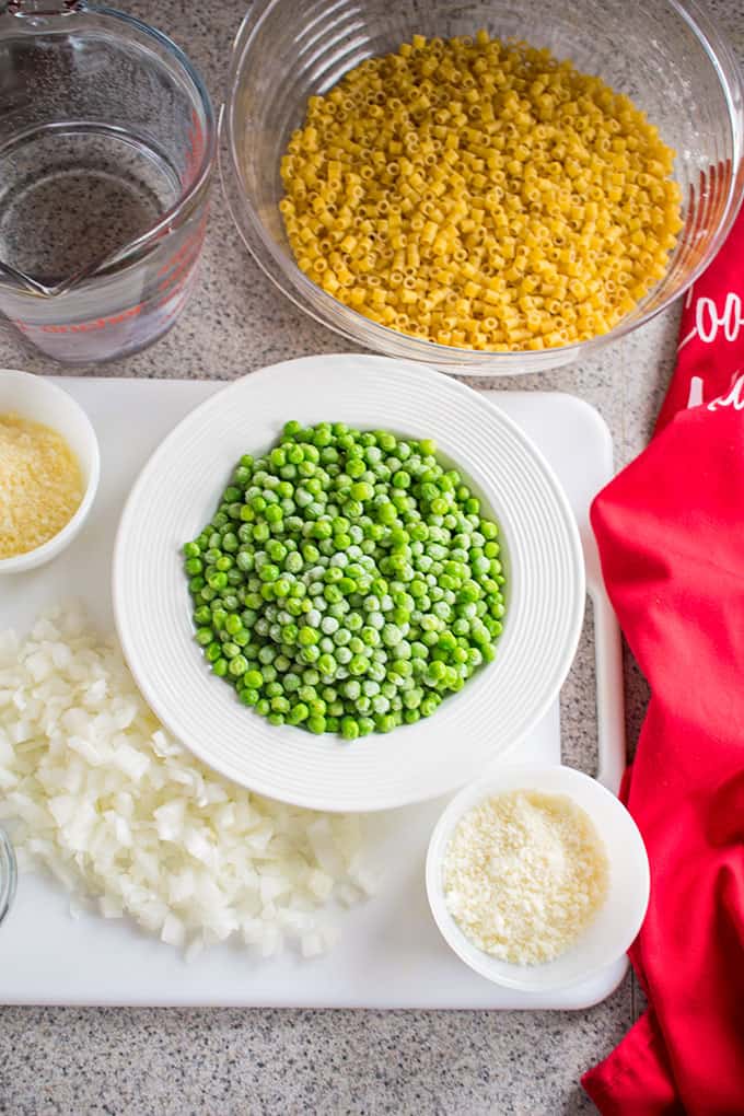 Overhead photo of ingredients for Pasta e Piselli (Pasta with Peas)