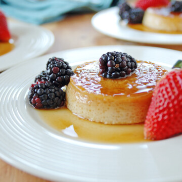 plate of Low Fat Maple Flan with Berries with blackberries and strawberries