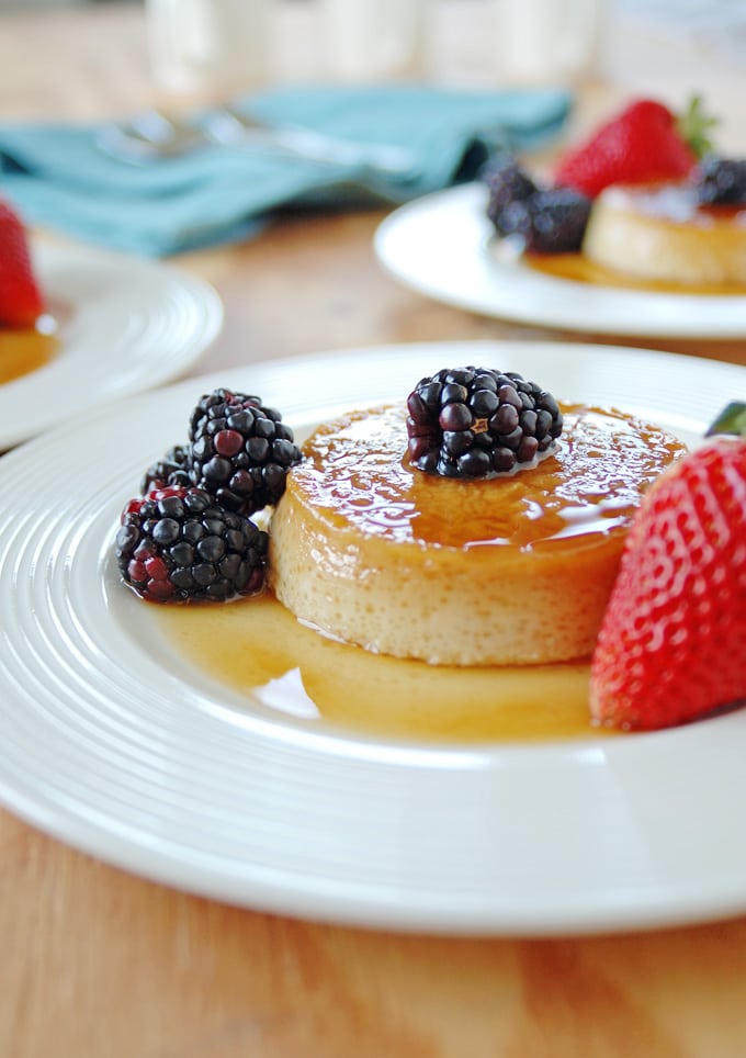 plate of Low Fat Maple Flan with Berries with blackberries and strawberries 
