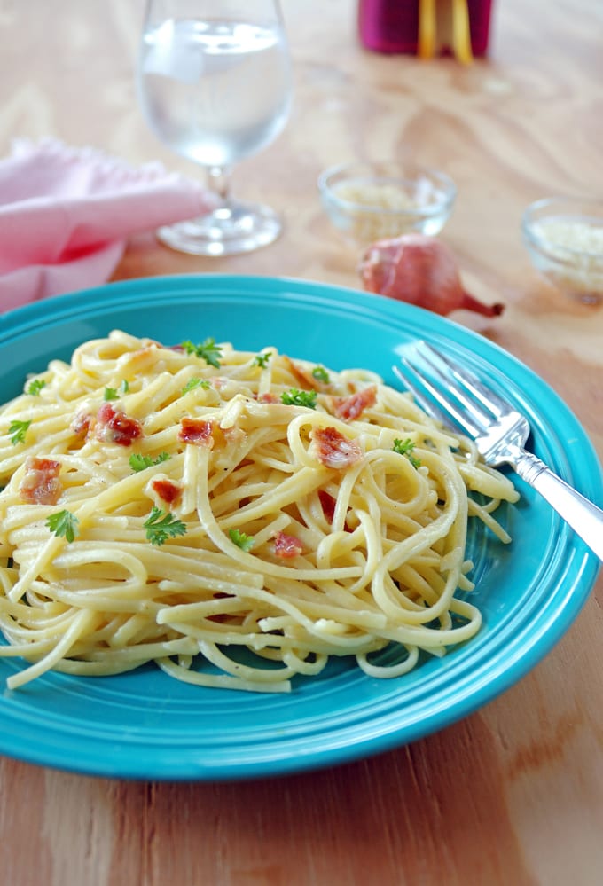 plate of Pasta Carbonara with Shallots with a fork