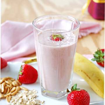 glass of Peanut Butter and Jelly Smoothie, banana, strawberries, peanuts and oats