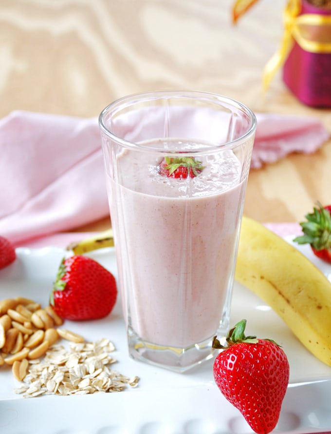 glass of Peanut Butter and Jelly Smoothie, banana, strawberries, peanuts and oats