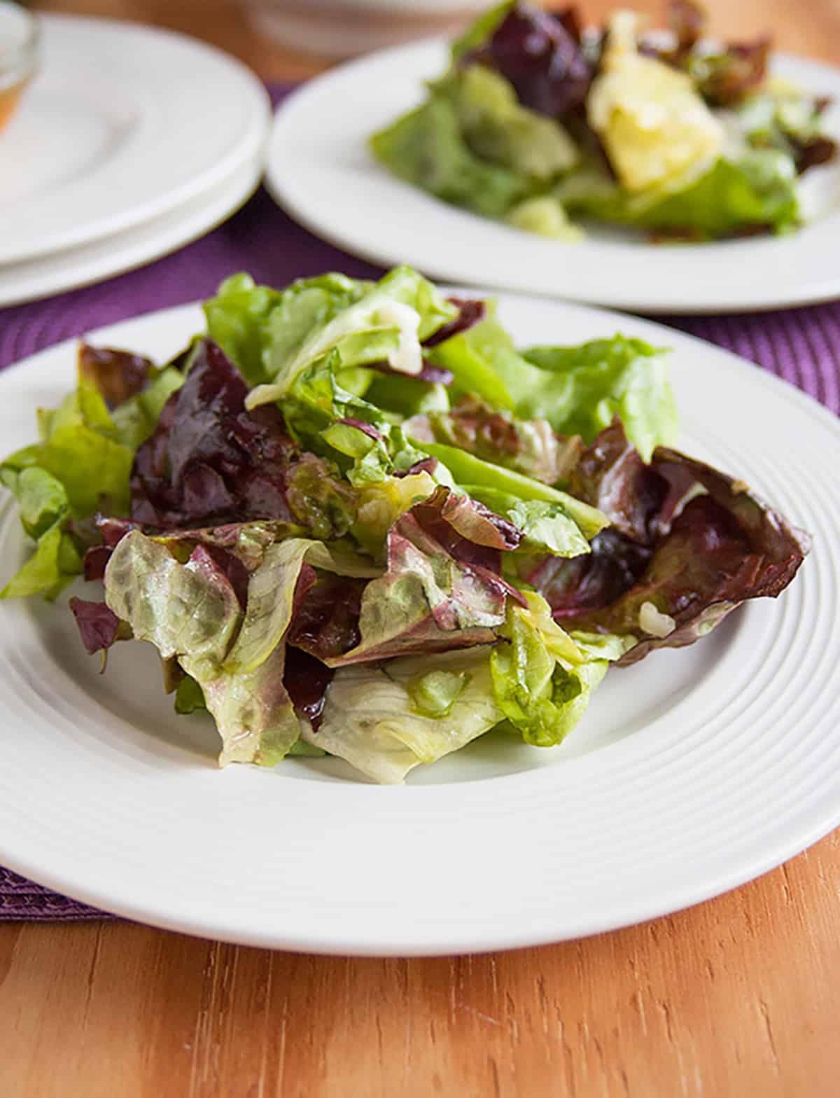 two plates of Italian Green Salad with Homemade Dressing