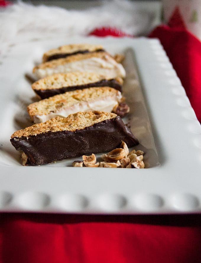 close-up of Chocolate-Dipped Hazelnut Biscotti on a platter