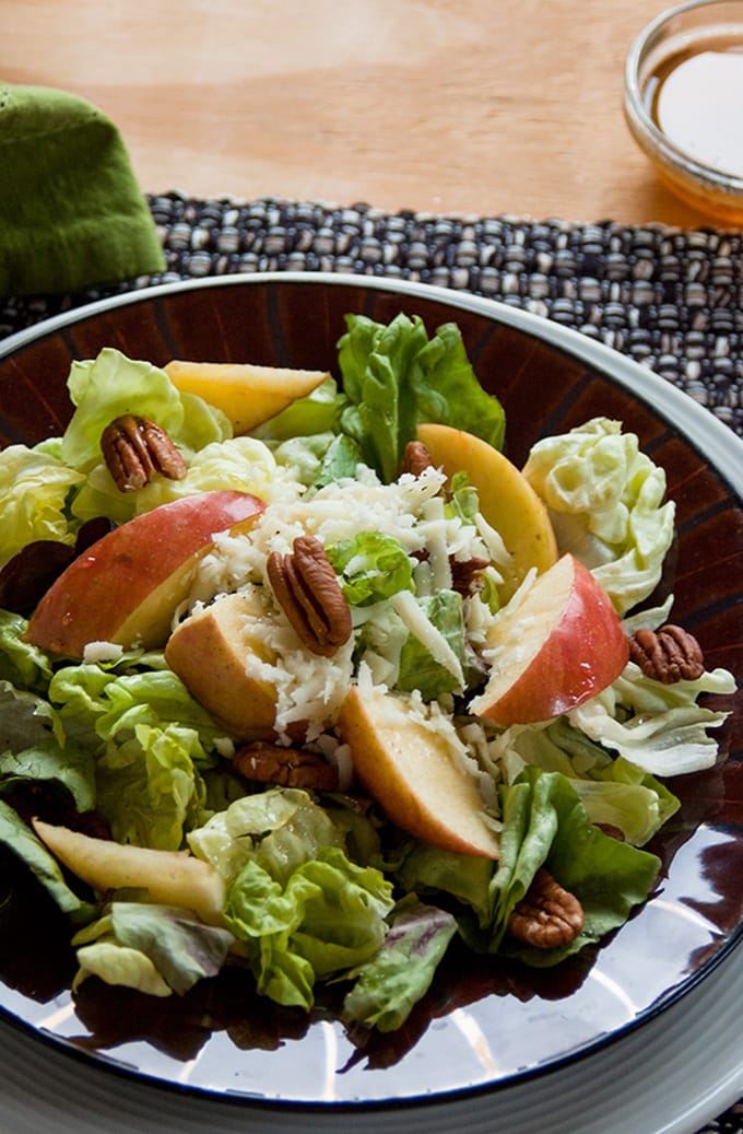 close-up photo of apple Mozzarella Pecan Salad with Maple Vinaigrette 
