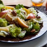 Apple Mozzarella Pecan Salad with Maple Vinaigrette in a bowl