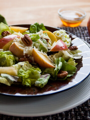 Apple Mozzarella Pecan Salad with Maple Vinaigrette in a bowl