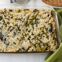 overhead view of Baked Vegetable Risotto with Asparagus and Spinach in a pan