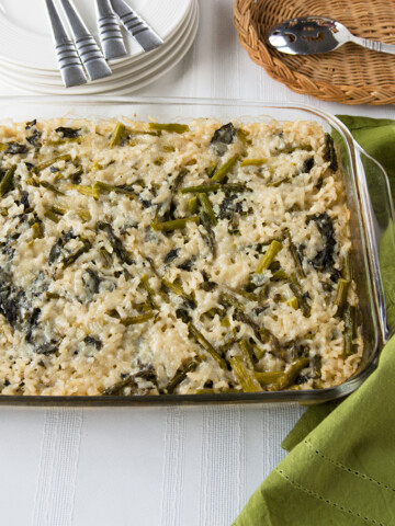 overhead view of Baked Vegetable Risotto with Asparagus and Spinach in a pan