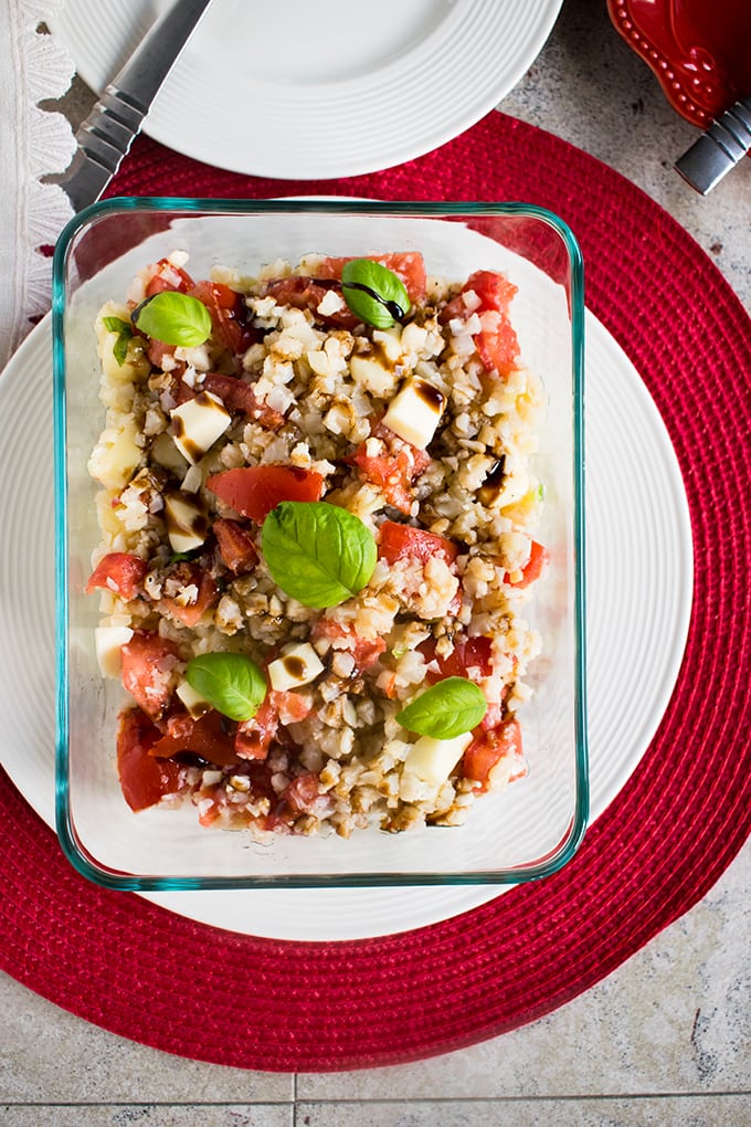 Cauliflower Rice Caprese in a cooking dish on a plate