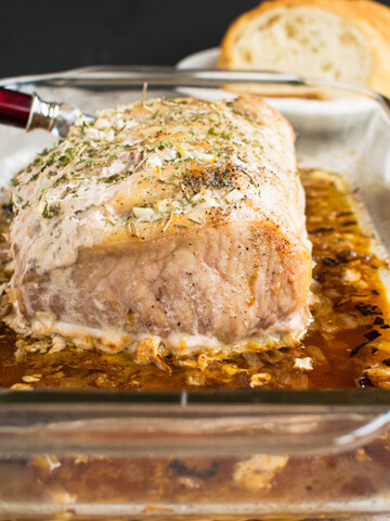 Roasted Pork Loin with Rosemary and Garlic in a pan