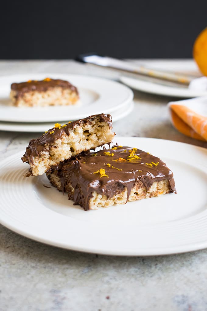 two plates with nutella rice krispie treats with orange