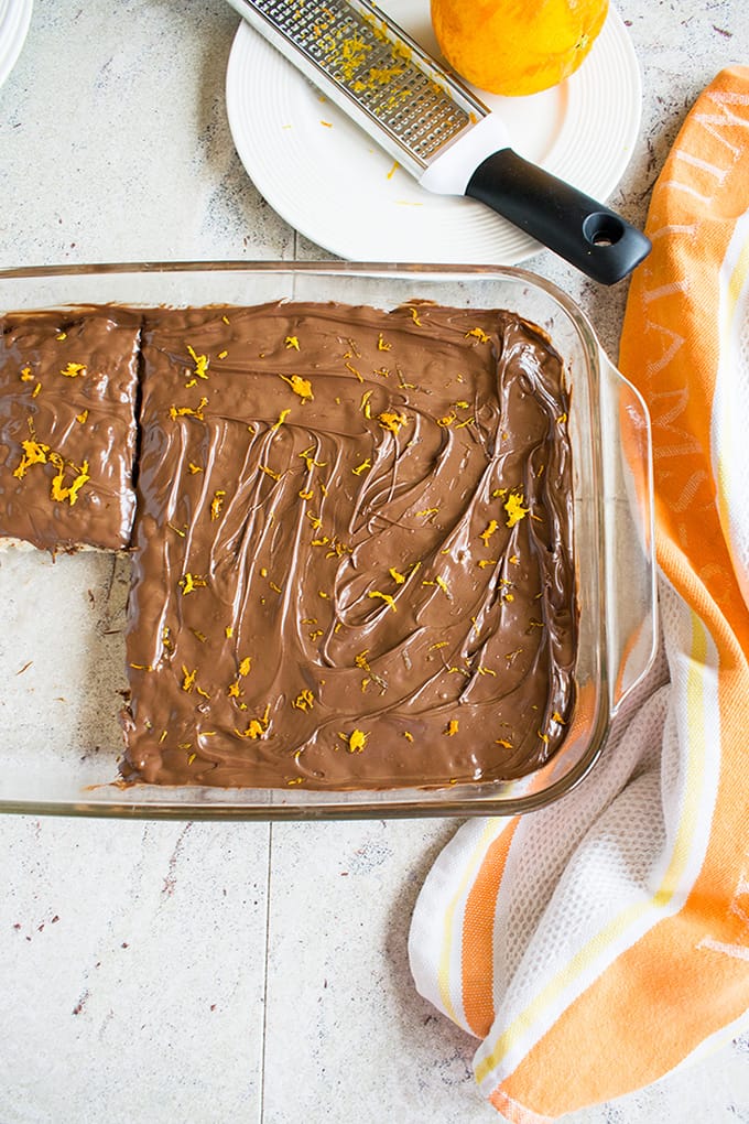 nutella rice krispie treats with orange in a baking pan