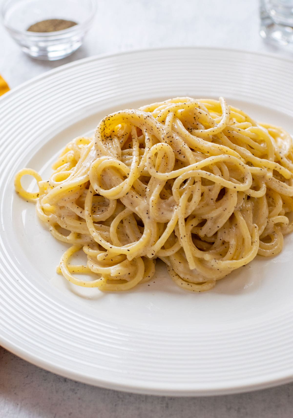 pasta with pecorino and pepper in a bowl