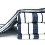 photo of folded and stacked william sonoma kitchen towels 