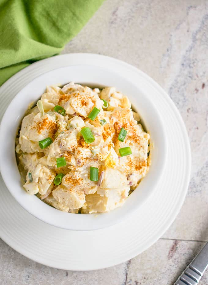 overhead view of deviled egg potato salad in a bowl 