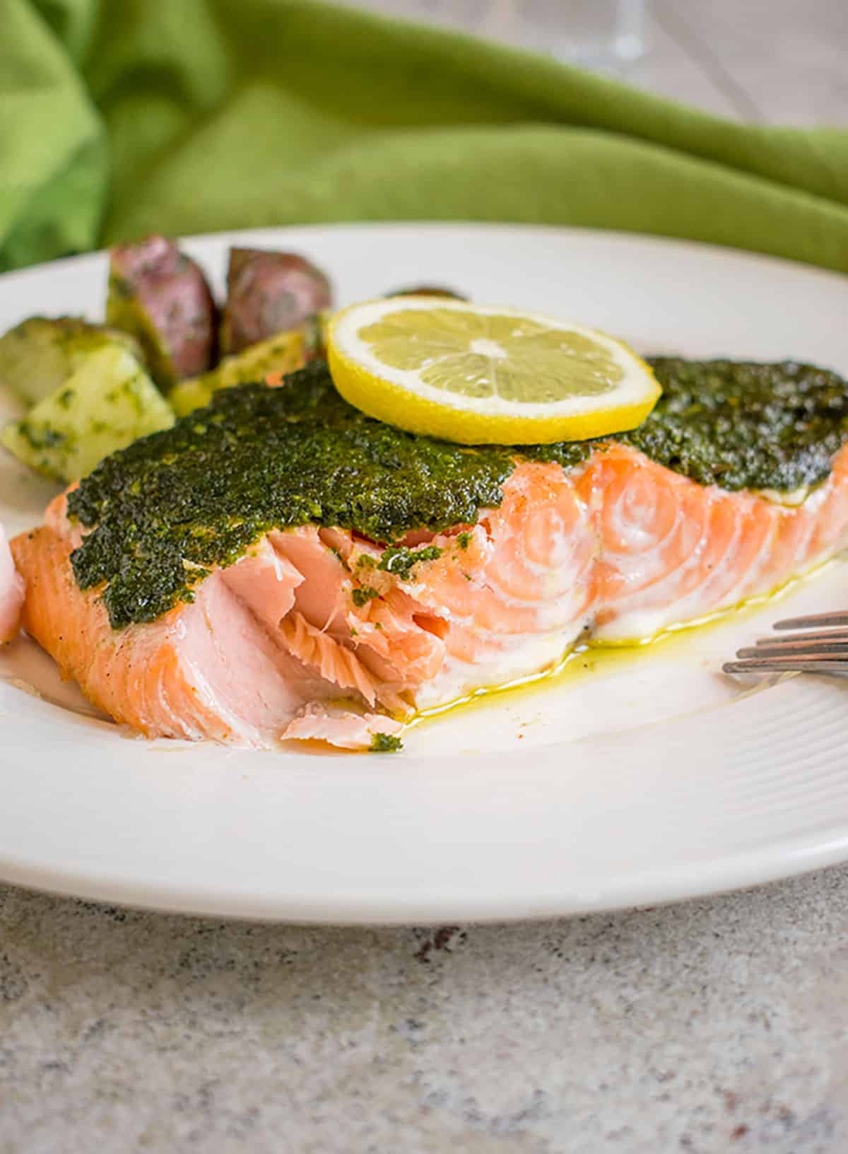 Photo of plate with pesto salmon and potatoes