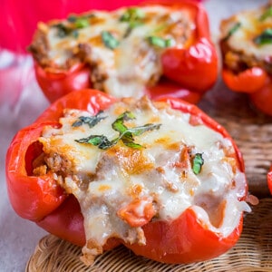 closeup of stuffed peppers with melted mozzarella