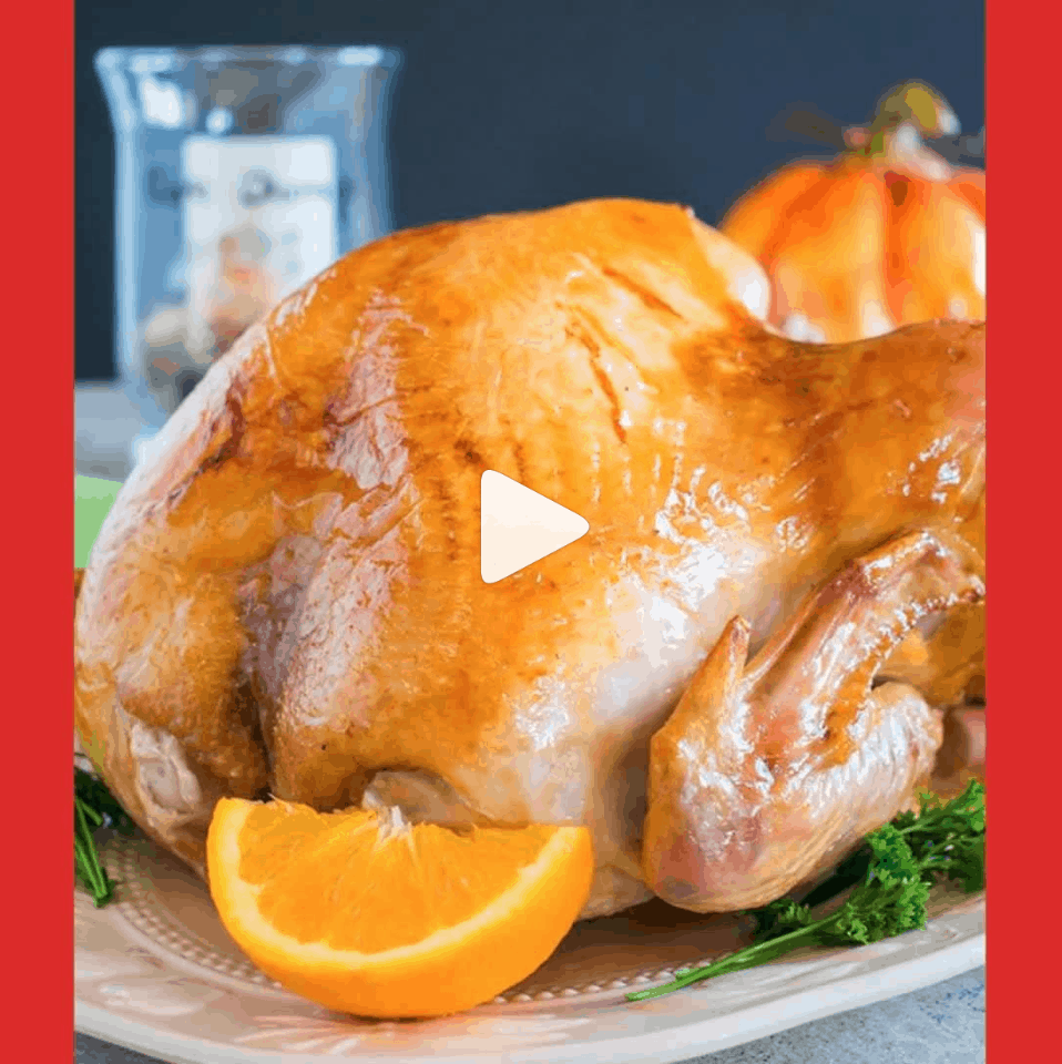 turkey on platter with orange wedge