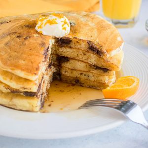 stack of chocolate chip pancakes cut open