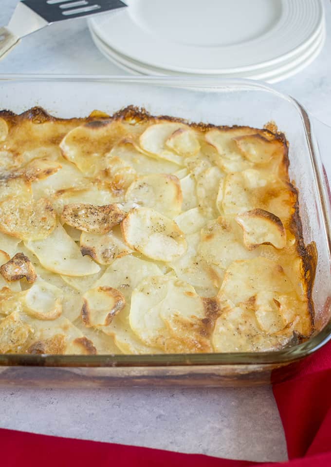 scalloped potatoes in glass pan