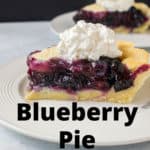 pinnable photo of slice of blueberry pie with whipped cream