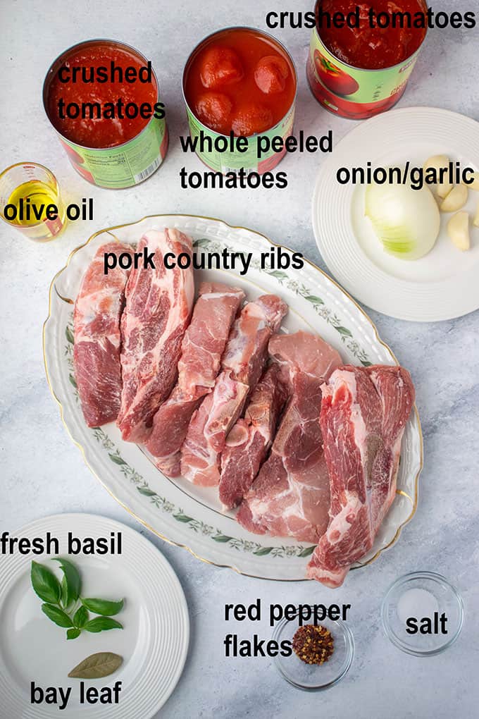 raw ribs, tomatoes, onion, ingredients