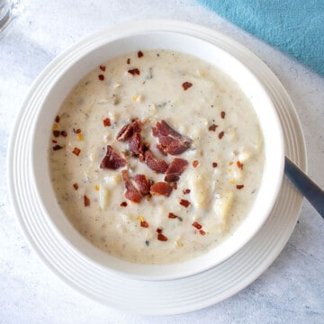 closeup view of bowl of chowder with bacon