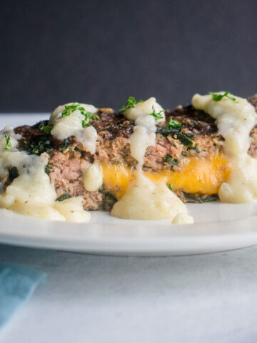 plate of meatloaf with cheddar and potato gravy