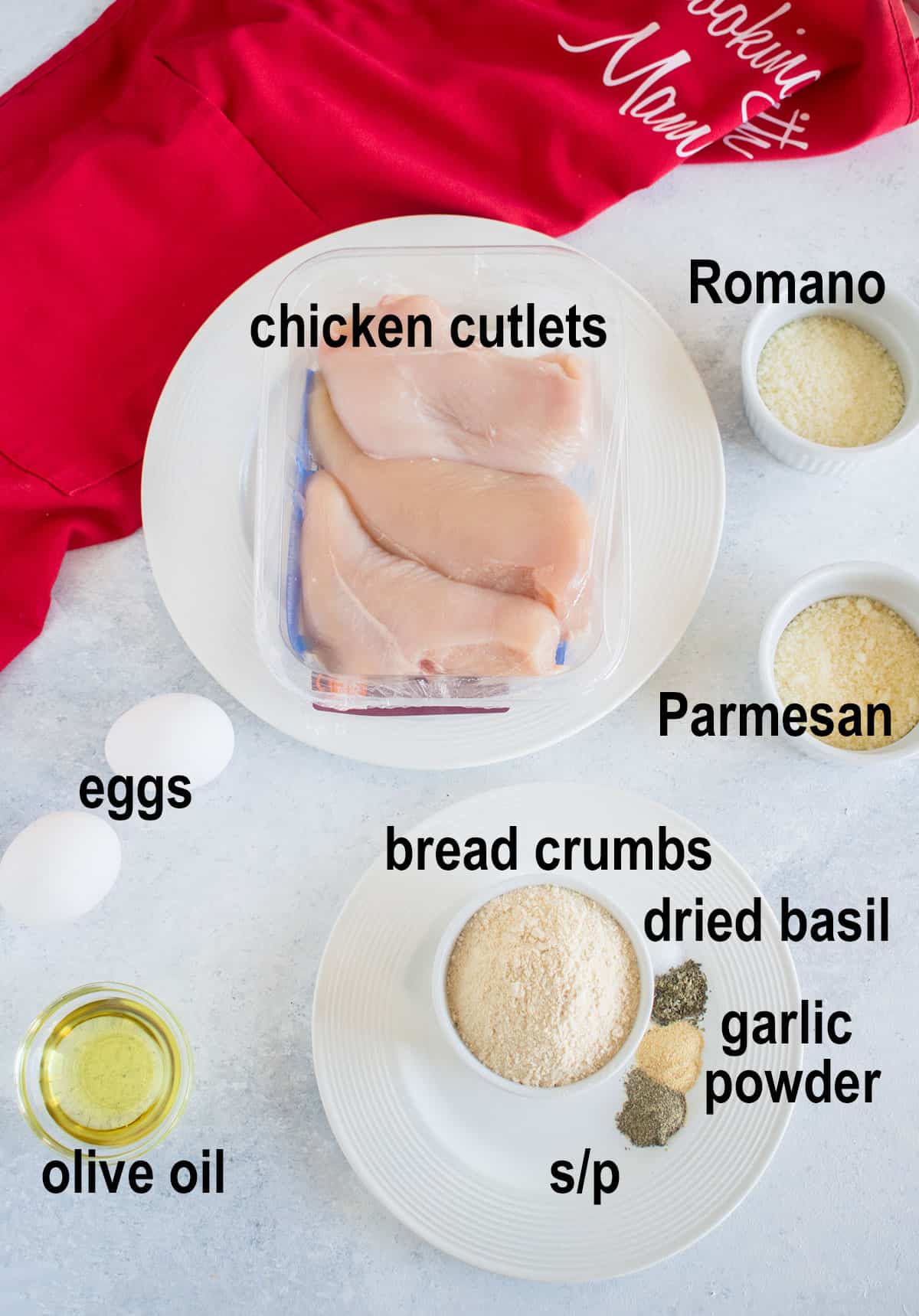 raw chicken cutlets, eggs, cheese, bread crumbs, seasonings, oil