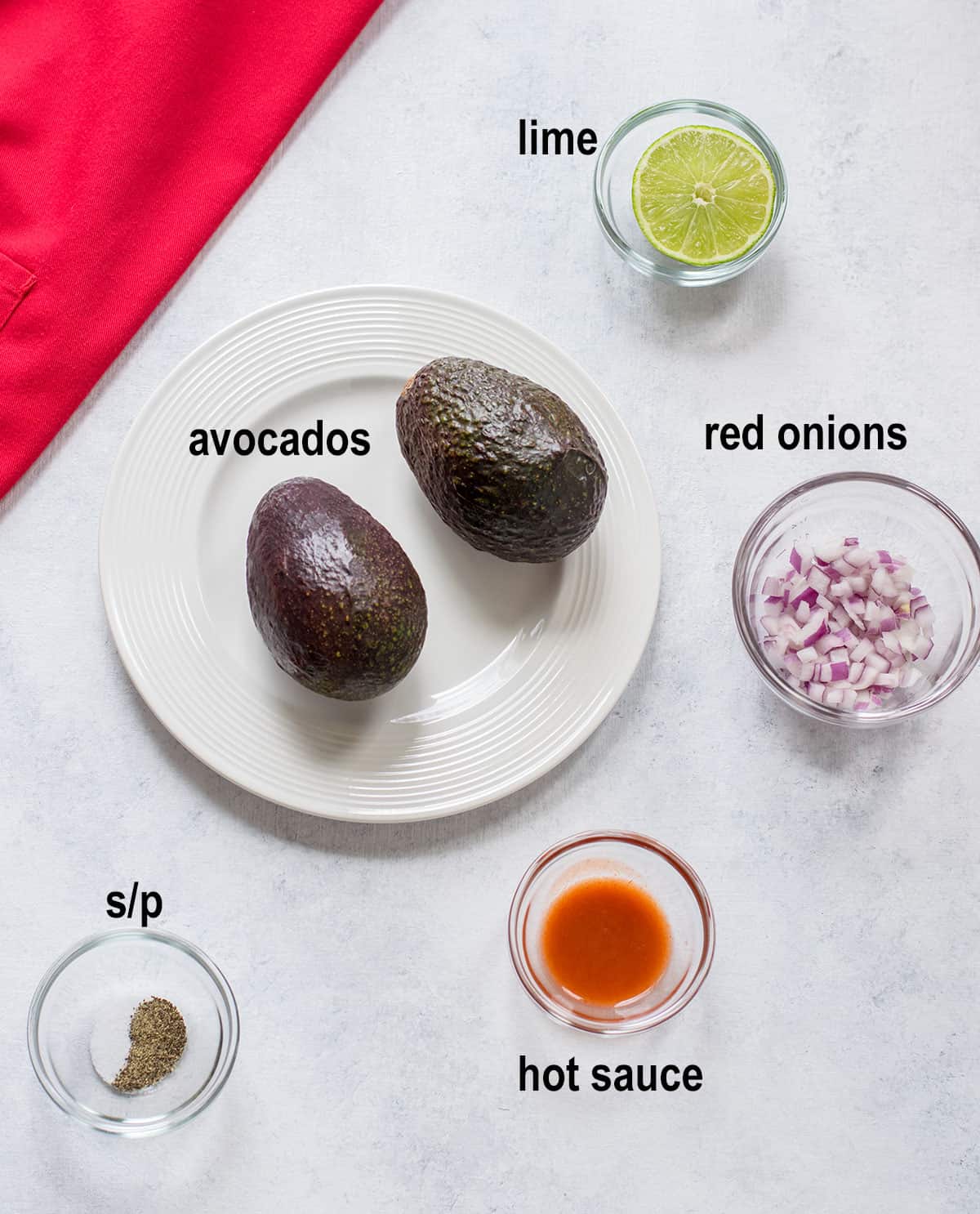 avocados, lime, chopped red onions, hot sauce, salt, pepper