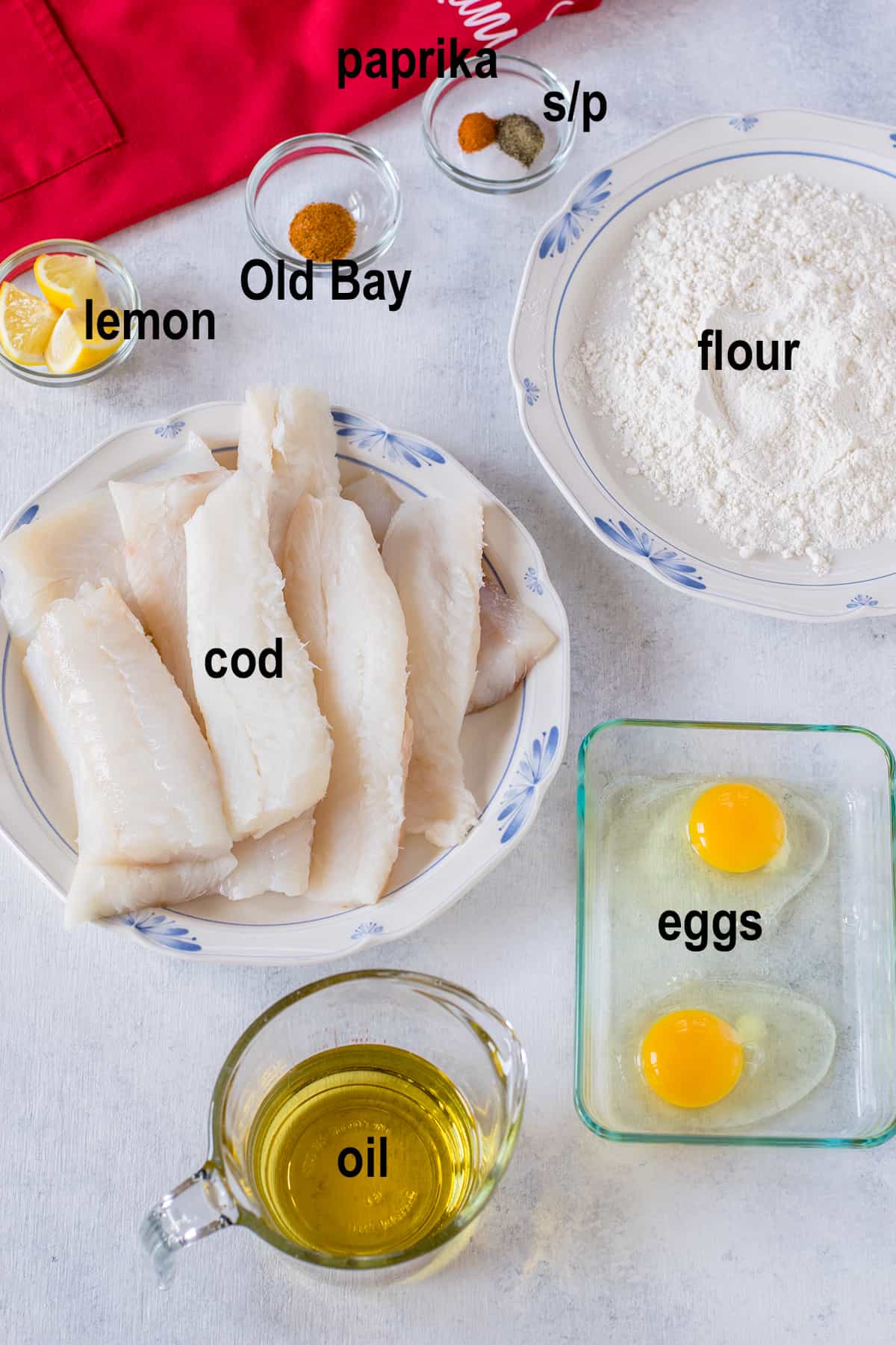 raw fish, lemon, seasonings, flour, eggs, oil