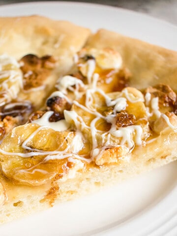 closeup of banana pizza with white chocolate