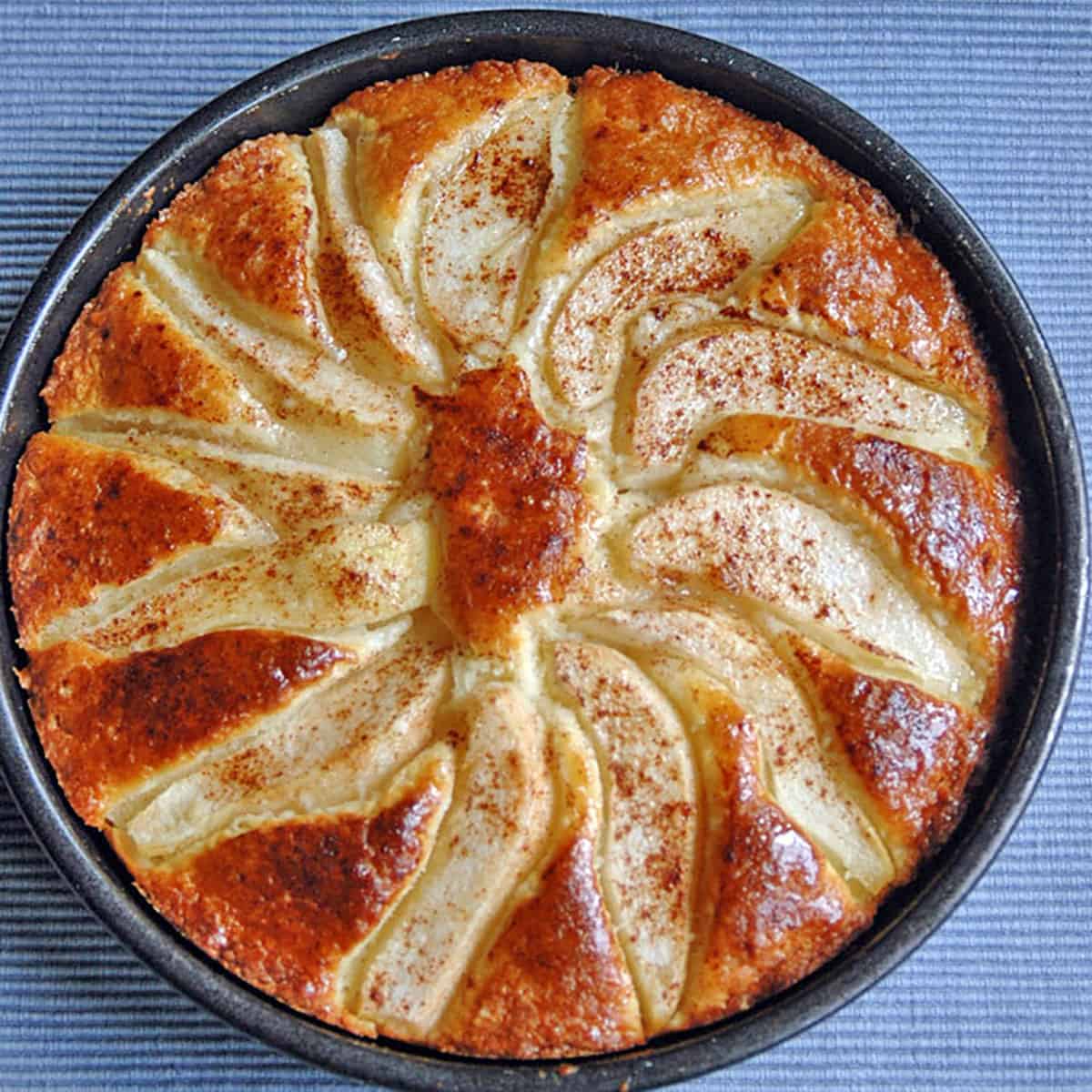 overhead view of pear cake in pan