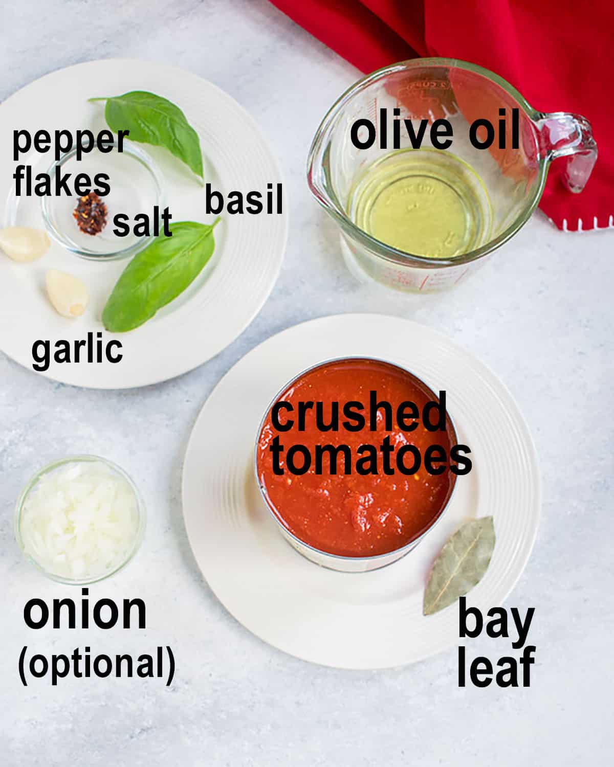 oil, can of crushed tomatoes, bay leaf, onion, basil, garlic, seasonings