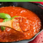 pinnable image of spoonful of pasta sauce from pan