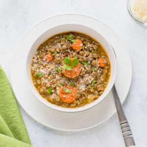 bowl of lentil soup with spoon.