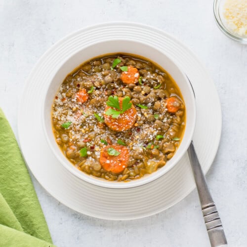bowl of lentil soup with spoon.