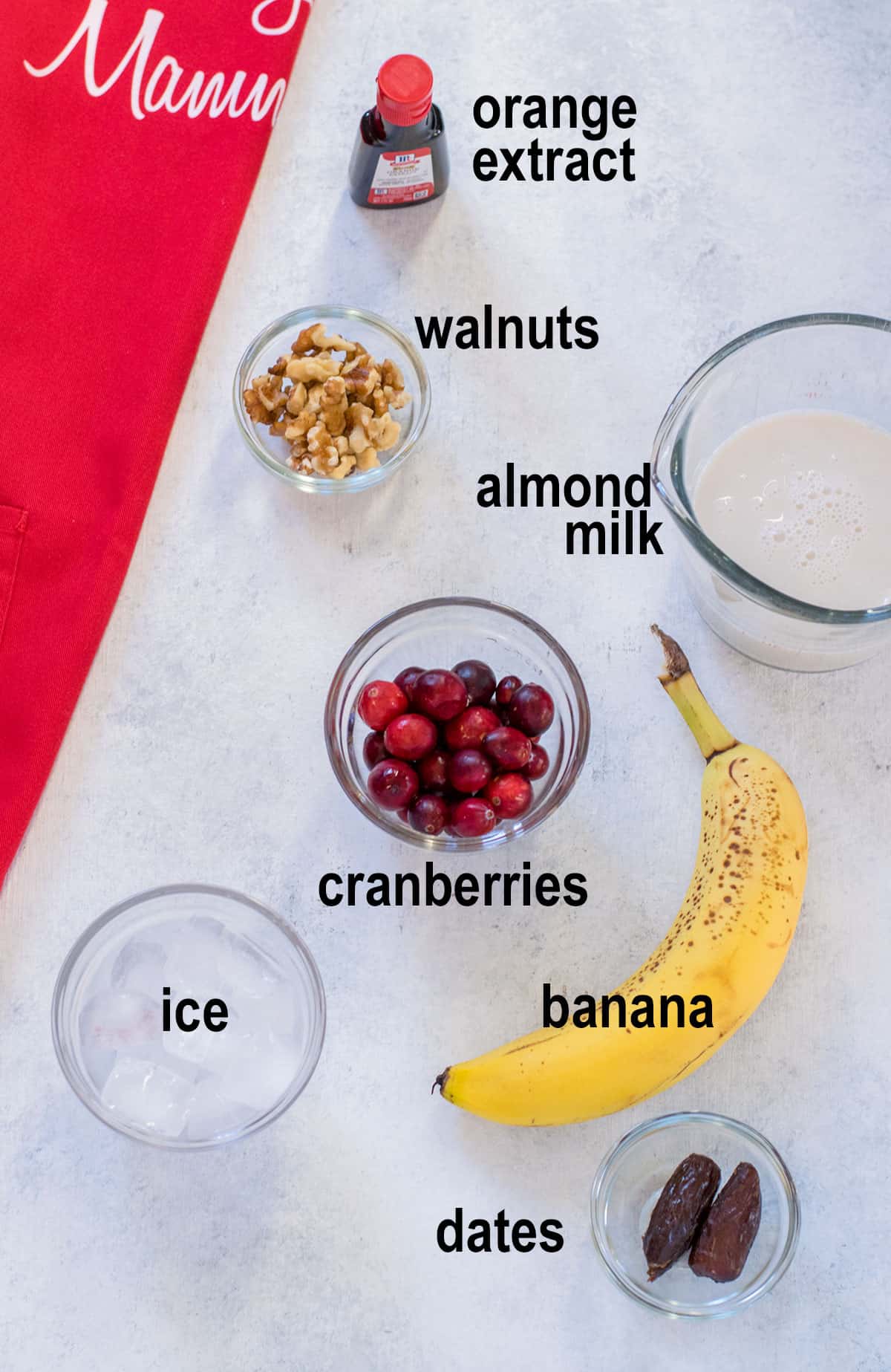 cranberries, banana, walnuts, almond milk, ice, dates, orange extract